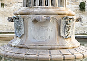 Closeup view of the base of The Fountain of Harmony in front of Castle Charles V, Lecce photo